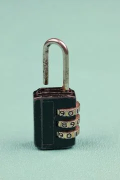 Black padlock with password,pass code on blue background 스톡 사진