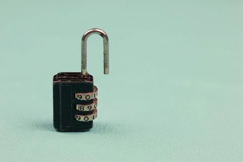 Black padlock with password,pass code on blue background 写真素材
