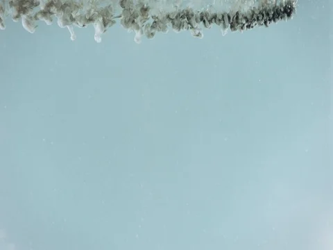 Black paint on the dark background Stock Footage 79814730