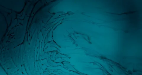 Black paint drips into cloudy liquid Stock Footage 114087120