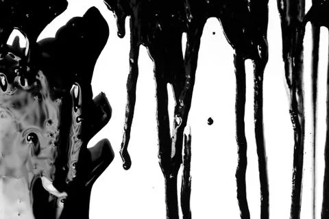 Black paint on a white background Stock Photos
