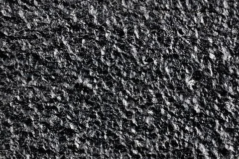 Black painted cast iron texture surface background macro close up rough metal Stock Photos
