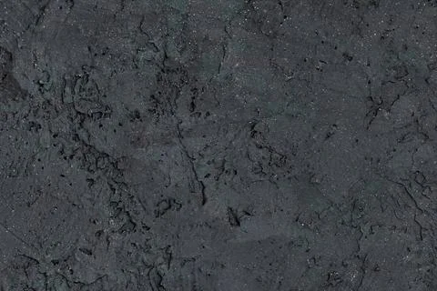 Black painted wall, texture of decorative plaster close-up Stock Photos