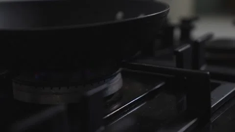A black pan with a burner on top of it Stock Footage 305983242