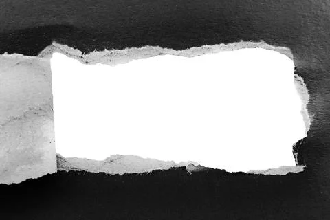 Black paper background with copy space. Hole on a crumpled dark sheet Stock Photos