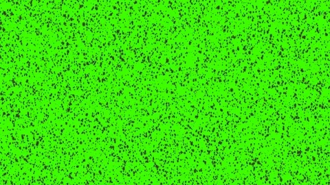 Black particles raining on green background. Stock Footage 113331288