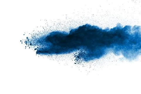 Black particles splatter on white background. Black powder dust burst. Foto stock