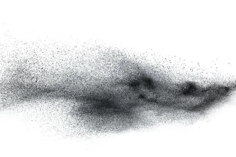 Black particles splatter on white background. Black dust splash. Stock Photos