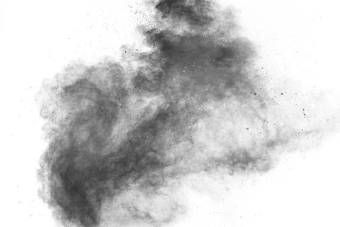 Black particles splatter on white background. Black powder dust exploding. Stock Photos