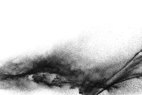 Black particles splattered on white background. Black powder dust splashing. Stock Photos