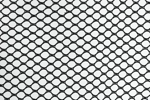 Black patterned net tile texture on white Stock Photos