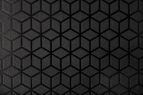 Black patterned textured background Stock Photos