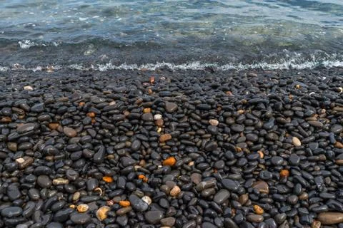 Black Pebble Beach Stock Photos