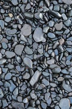 Black pebbles Stock Photos