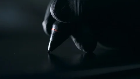Black pen on a black background close-up Stock Footage 112142887