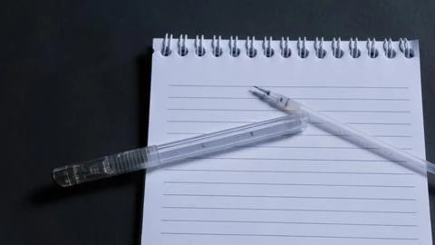 Black pen run out of ink, Open and refill  pen with new ink on adesk. Copy sp Stock Photos