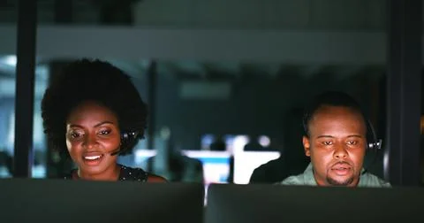 Black people, headset and computer in call centre at night for customer ser.. 스톡 사진