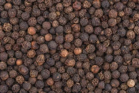 Black pepper background close up. Foto stock