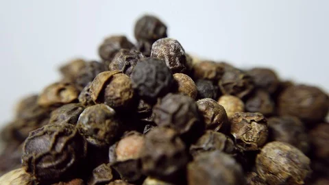 Black pepper in closeup, looping 360 macro video Stock Footage 129799932