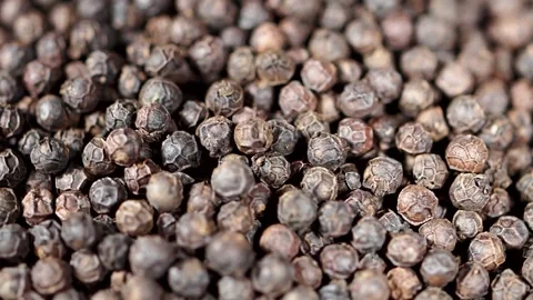 Black pepper corns on a turntable, close-up Stock Footage 157988824