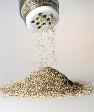 Black Pepper Grains Falling Stock Photos