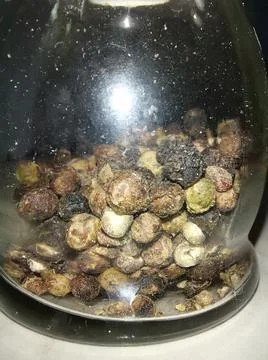 Black Pepper in a grinder Stock Photos