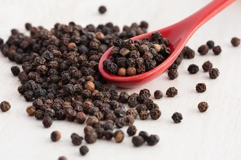 Black pepper pips close up Stock Photos