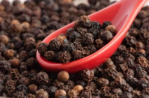 Black pepper pips close up Stock Photos