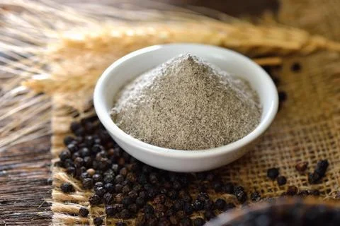 Black pepper powder on table Stock Photos