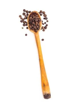 Black pepper in a spoon Stock Photos