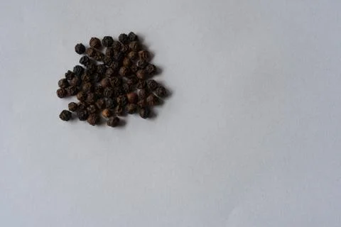 Black pepper was placed on a white background Stock Photos