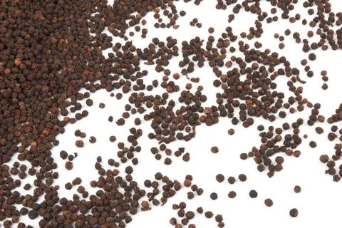Black pepper on white Stock Photos