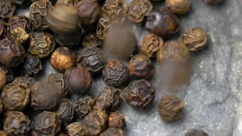 Black Peppercorns Falling into Kitchen Mortar Slow Motion Stock Footage 146806085