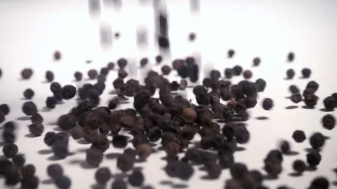 Black Peppercorns falling in slow motion Stock-Footage 76564002