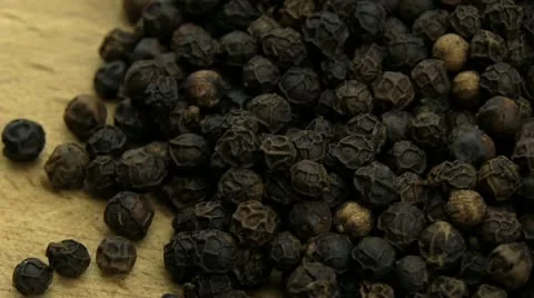 Black peppercorns Stock Footage