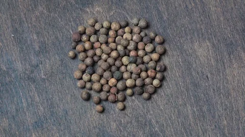 Black peppercorns rotating Stock Footage 101760834