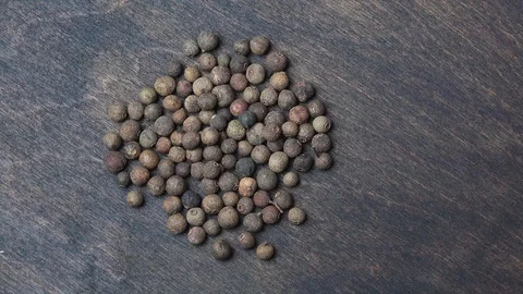 Black peppercorns rotating Stock Footage 101760836