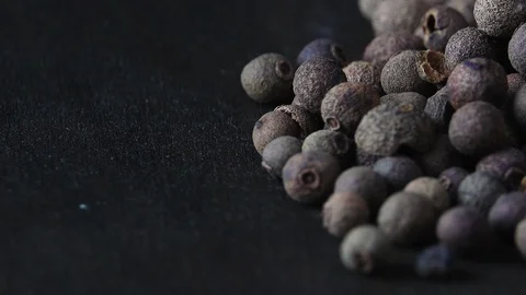 Black peppercorns rotating Stock Footage 101765697