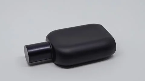 Black perfume bottle Stock Photos