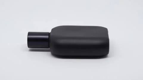 Black perfume bottle Stock Photos