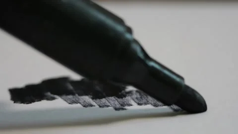 Black Permanent Marker Writing on White Paper Leaving Bold Trail with Loud Stock Footage 321527585