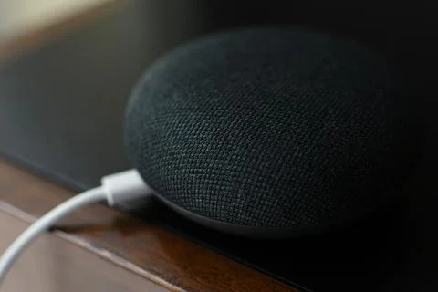 Black physical microphone switch button with cable Smart home device bluetoot Stock Photos