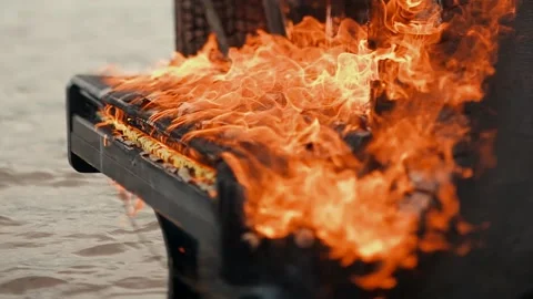 Black Piano in fire flames Stock Footage 140849276