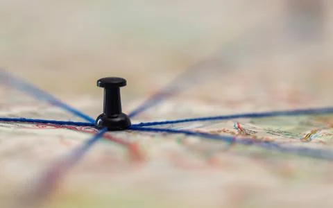 The black pin marks a location on a map with routes Stock Photos