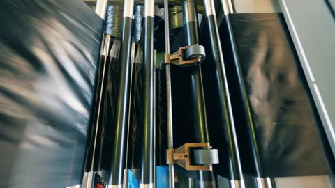 Black plastic bag manufacturing machine. Top view Stock Footage 145014292