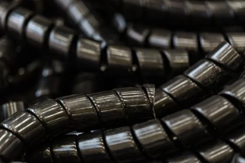 Black plastic cable screening braid Stock Photos