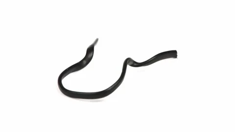 Black plastic coated wire tie used for a variety of things Stock Footage 238496981