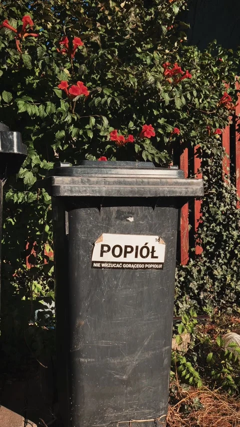 Black, plastic container for ash (garbage) with the Polish inscription Stock Footage 321096349