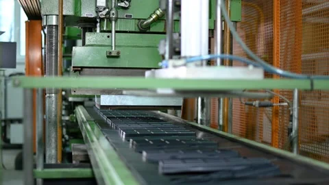 Black plastic containers molding process in the production plant Stock Footage 225145861