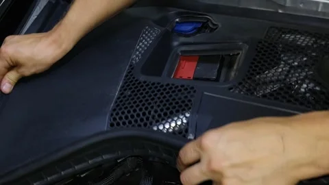 A black plastic cowl panel with honeycomb grilles and an open Stock Footage 343420231